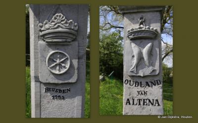 Oude grenspalen die de grens aangeven tussen de vroegere streken Land van Heusden en Land van Altena, aan de Maasdijk tussen de dorpen Veen en Andel