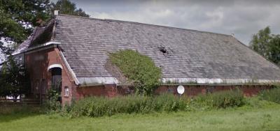 Boerderij Heidenschap had anno 2016 alleen nog maar een gaatje in het dak. (© Google StreetView)