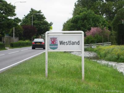 De gemeente Westland heet je welkom met een mooi bord met gemeentewapen